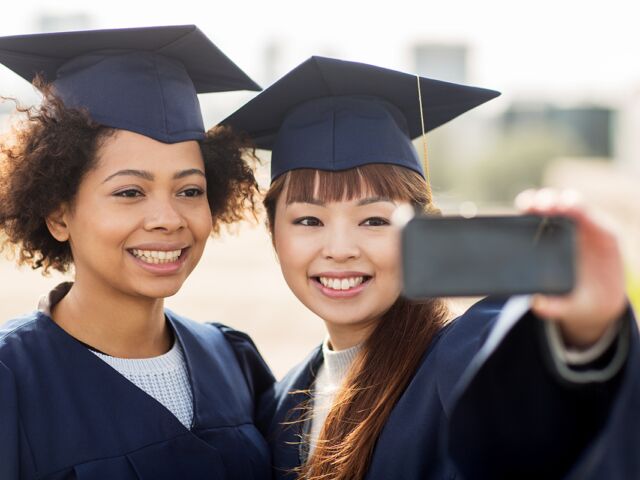 Education,,Graduation,,Technology,And,People,Concept,-,Group,Of,Happy