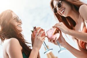 Splashing,Fun,In,The,Sun.,Close,Up,Of,Girls,Sitting