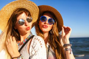 Close-up,Portrait,Of,Two,Gorgeous,Girls,Having,Fun,On,The