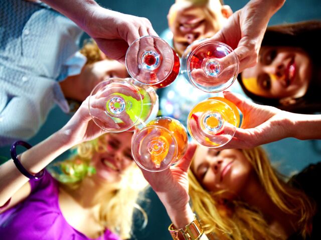 Below,View,Of,People,Clinking,Glasses,With,Each,Other