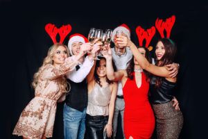 Group,Of,Young,People,Are,Drinking,Champagne,And,Celebrating,Christmas