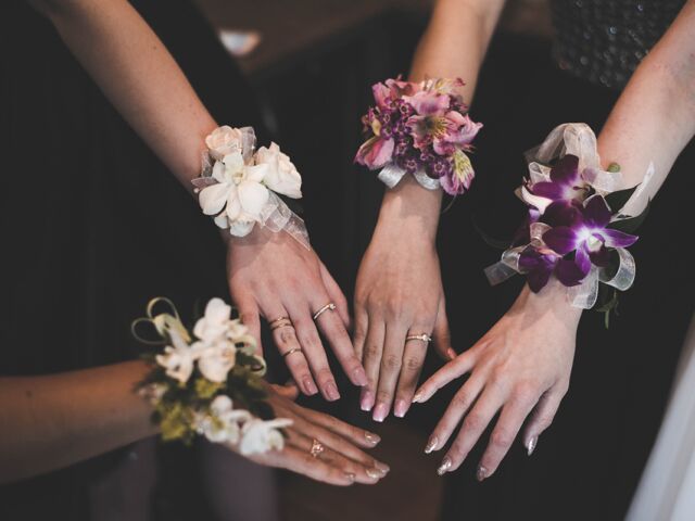 Beautiful,Image,Of,Girls,Showing,Their,Floral,Corsages.