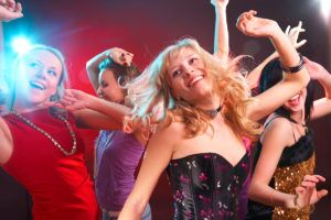 Dance,Happy,Young,Girls,Under,Masks,On,The,Party