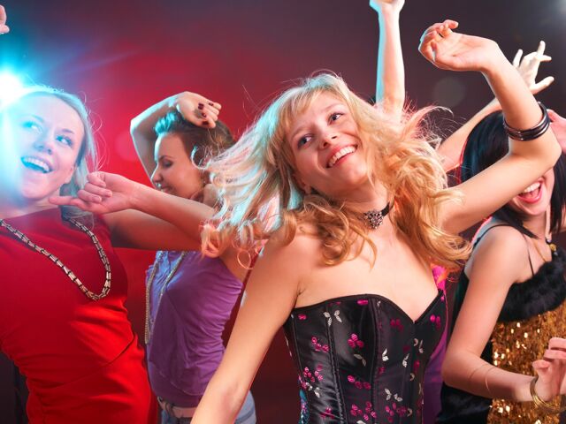 Dance,Happy,Young,Girls,Under,Masks,On,The,Party