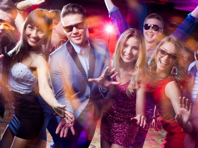 Group,Of,Young,People,Having,Fun,Dancing,At,Party.