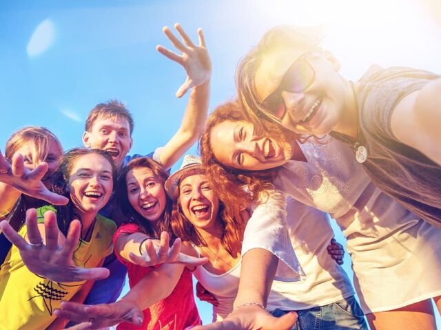 A,Group,Of,Young,People,Friends,Make,Selfies,On,The