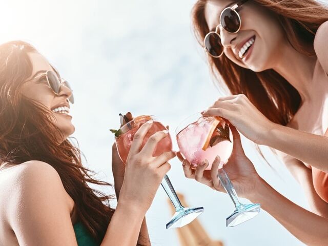 Splashing,Fun,In,The,Sun.,Close,Up,Of,Girls,Sitting