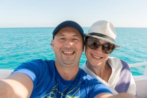 Happy,Middle,Aged,Couple,Taking,Selfie,On,Yacht.,Beautiful,Happy