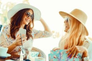 Two,Beautiful,Young,Women,In,Cafe,After,Shopping
