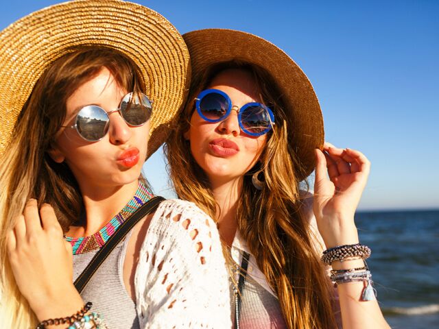 Close-up,Portrait,Of,Two,Gorgeous,Girls,Having,Fun,On,The